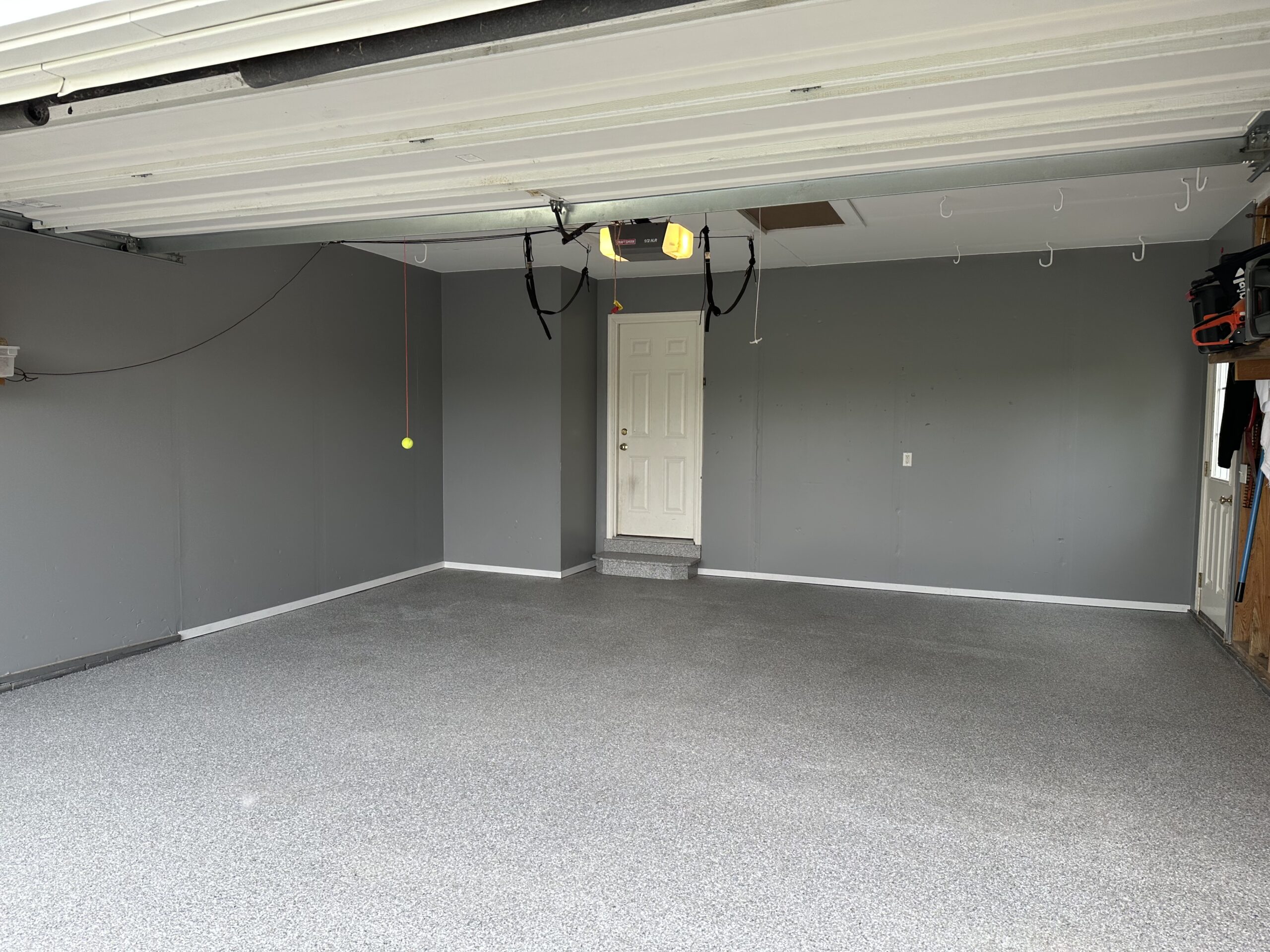 Finished gray flake garage floor